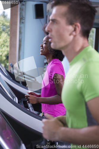 Image of people exercisinng a cardio on treadmill in gym