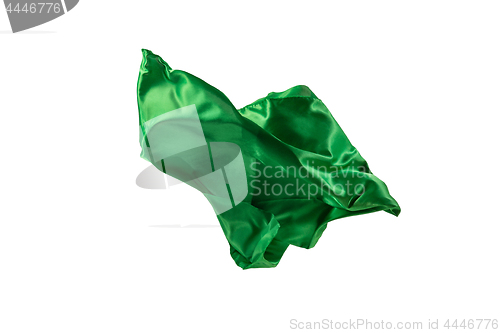 Image of Smooth elegant transparent green cloth separated on white background.