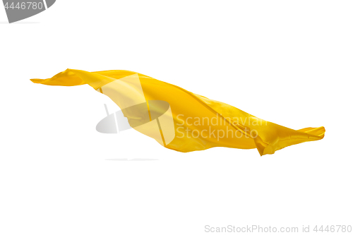 Image of Smooth elegant transparent yellow cloth separated on white background.