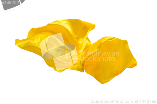 Image of Smooth elegant transparent yellow cloth separated on white background.