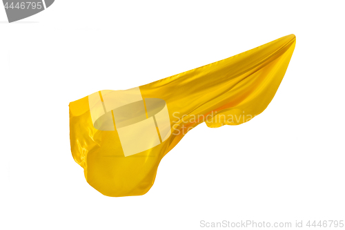 Image of Smooth elegant transparent yellow cloth separated on white background.