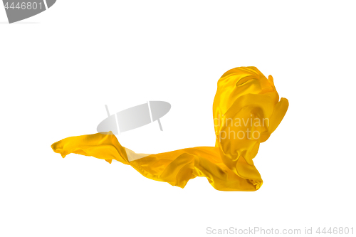 Image of Smooth elegant transparent yellow cloth separated on white background.