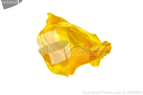 Image of Smooth elegant transparent yellow cloth separated on white background.