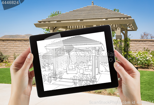 Image of Female Hands Holding Computer Tablet with Drawing of Pergola on 