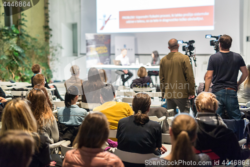 Image of Media interview and round table discussion at popular scientific conference.