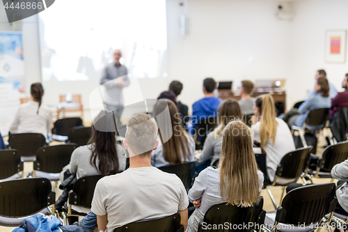 Image of Professor lecturing in lecture hall at university.