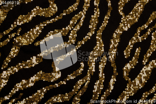 Image of Black fabric with golden sequin pattern 