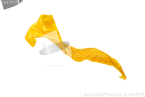 Image of Smooth elegant transparent yellow cloth separated on white background.