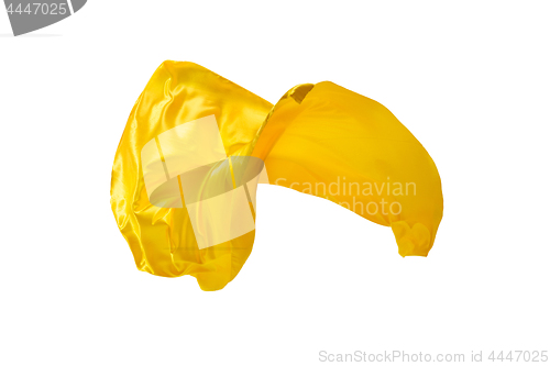 Image of Smooth elegant transparent yellow cloth separated on white background.