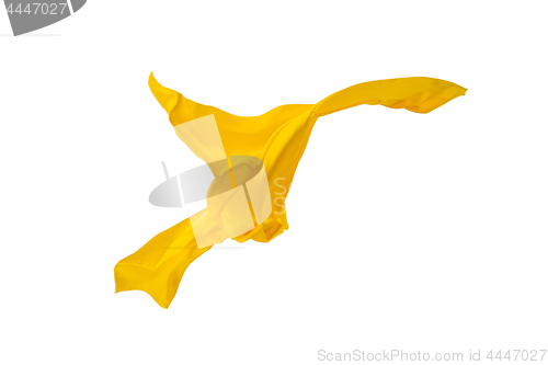 Image of Smooth elegant transparent yellow cloth separated on white background.