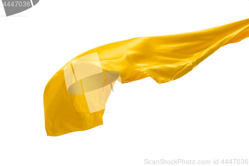 Image of Smooth elegant transparent yellow cloth separated on white background.