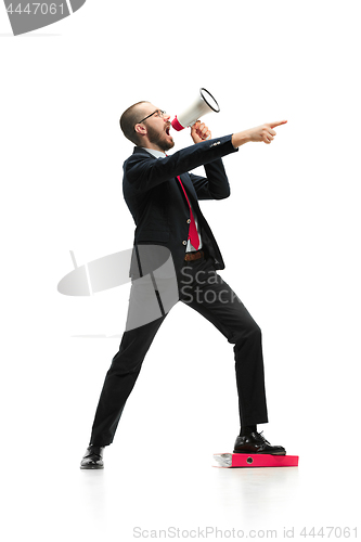 Image of Side view of a man screaming on the megaphone over white background