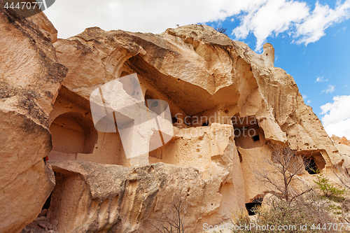 Image of Fairy houses stone cliffs