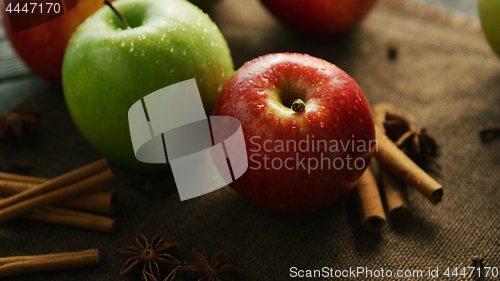 Image of Apples and spices on table 