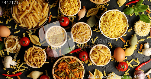 Image of Layout of pasta and ingredients for cooking