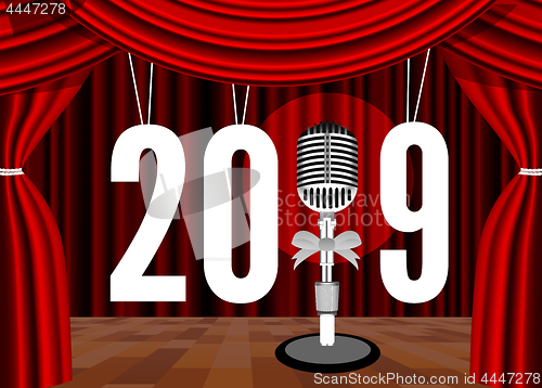 Image of Happy New Year 2019 on the background of the stage with a microphone