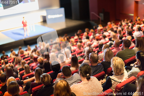 Image of Speaker giving presentation on scientific business conference.