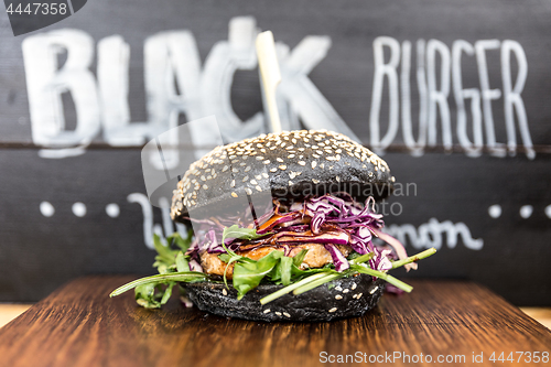 Image of Burger beeing sold on international urban street food festival.