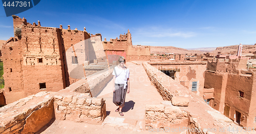 Image of Woman on travel at Ait Benhaddou kasbah, Ouarzazate, Morocco.