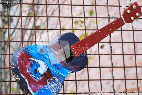 Image of Colorful acoustic guitar.