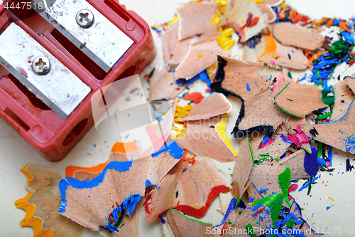 Image of Sharpener and colored pencil shavings