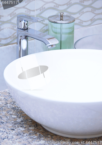 Image of Sink and water tap at home