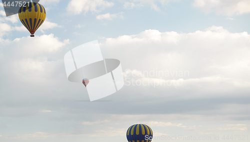 Image of Three air balloons flying in the sky