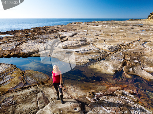 Image of Standing in a cratered landscape