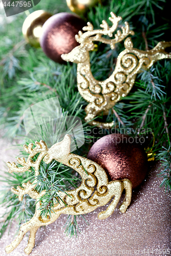 Image of Christmas decorations and fir tree.