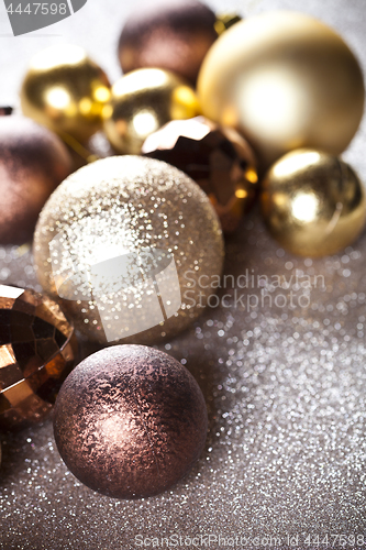 Image of Christmas golden and brown decorations.