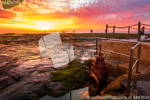 Image of Sunrise and fisherman at Mona Vale Australia