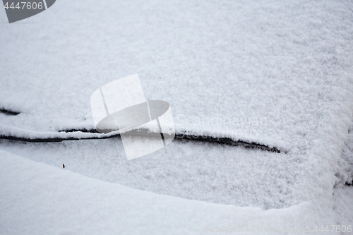 Image of Cars covered in fresh snow