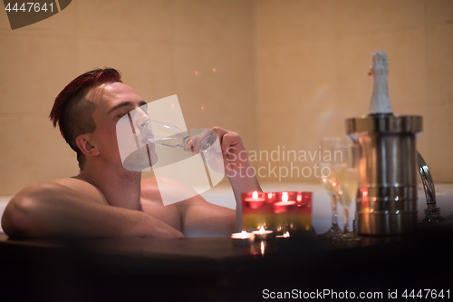 Image of man relaxing in the jacuzzi