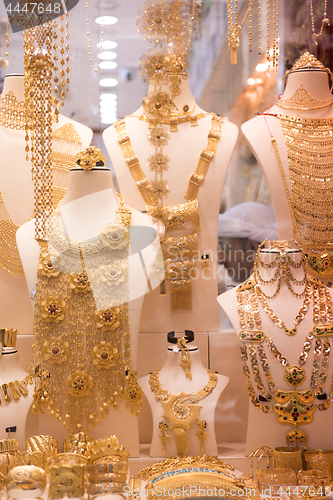 Image of gold jewelry in the shop window