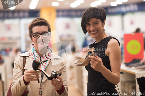 Image of best friend shopping in big mall