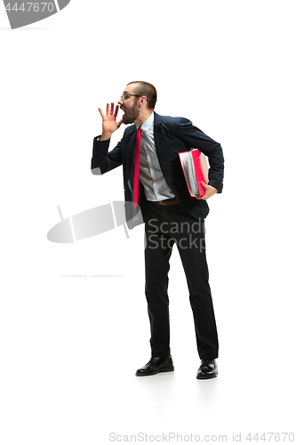 Image of Do not miss. Young casual man shouting. Shout. Crying emotional man screaming on white studio background