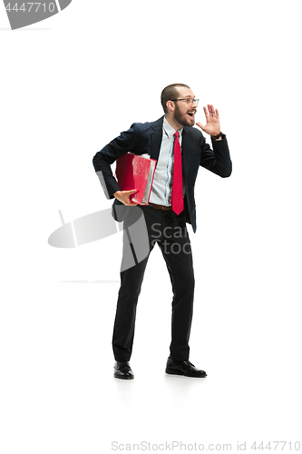 Image of Do not miss. Young casual man shouting. Shout. Crying emotional man screaming on white studio background