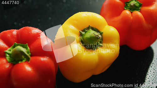 Image of Ripe red and yellow peppers