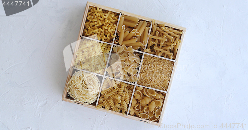 Image of Container with macaroni of different shape