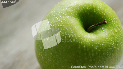 Image of Green apple with water drops