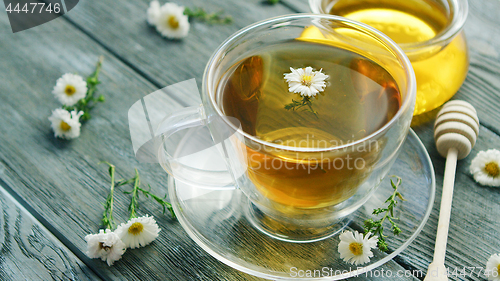 Image of Closeup of cup with camomile tea