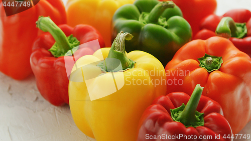 Image of Multicolored bell peppers in heap