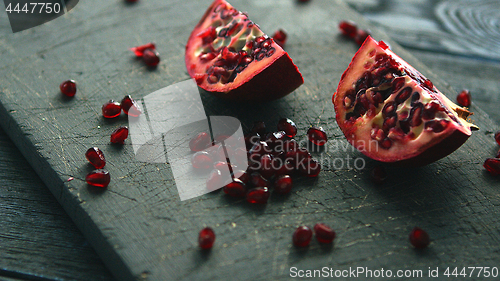 Image of Halves of pomegranate with seeds