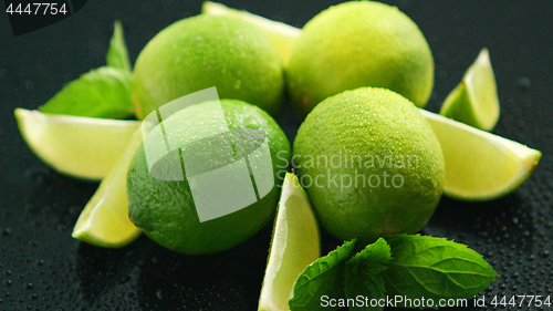 Image of Ripe green limes on table 