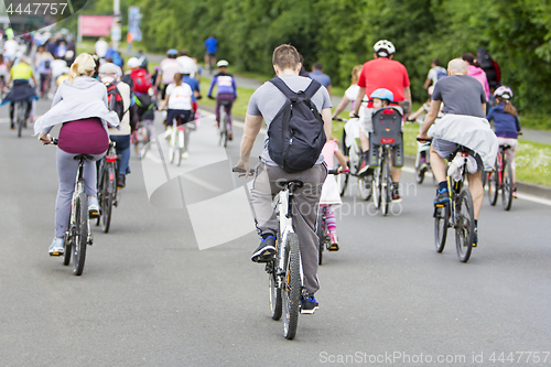 Image of Bicyclists in traffic on the streets of the city