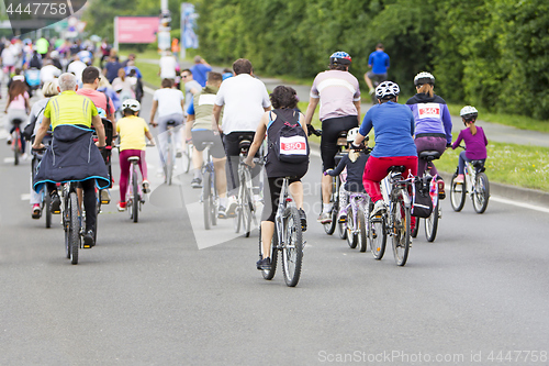 Image of Bicyclists in traffic on the streets of the city