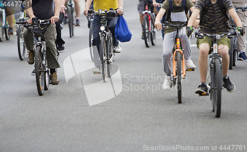 Image of Bicyclists in traffic on the streets of the city