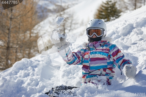 Image of Snowboarder having a rest