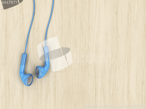 Image of Blue wired earphones, top view