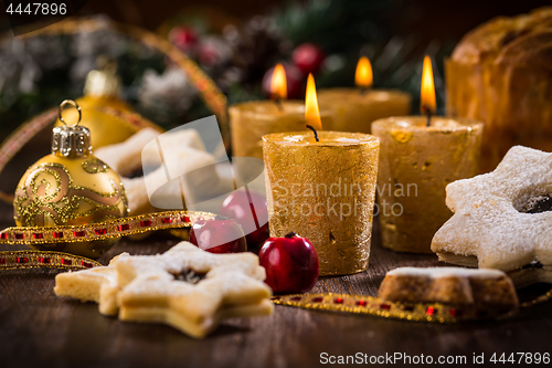 Image of Christmas candles with homemade cookies 